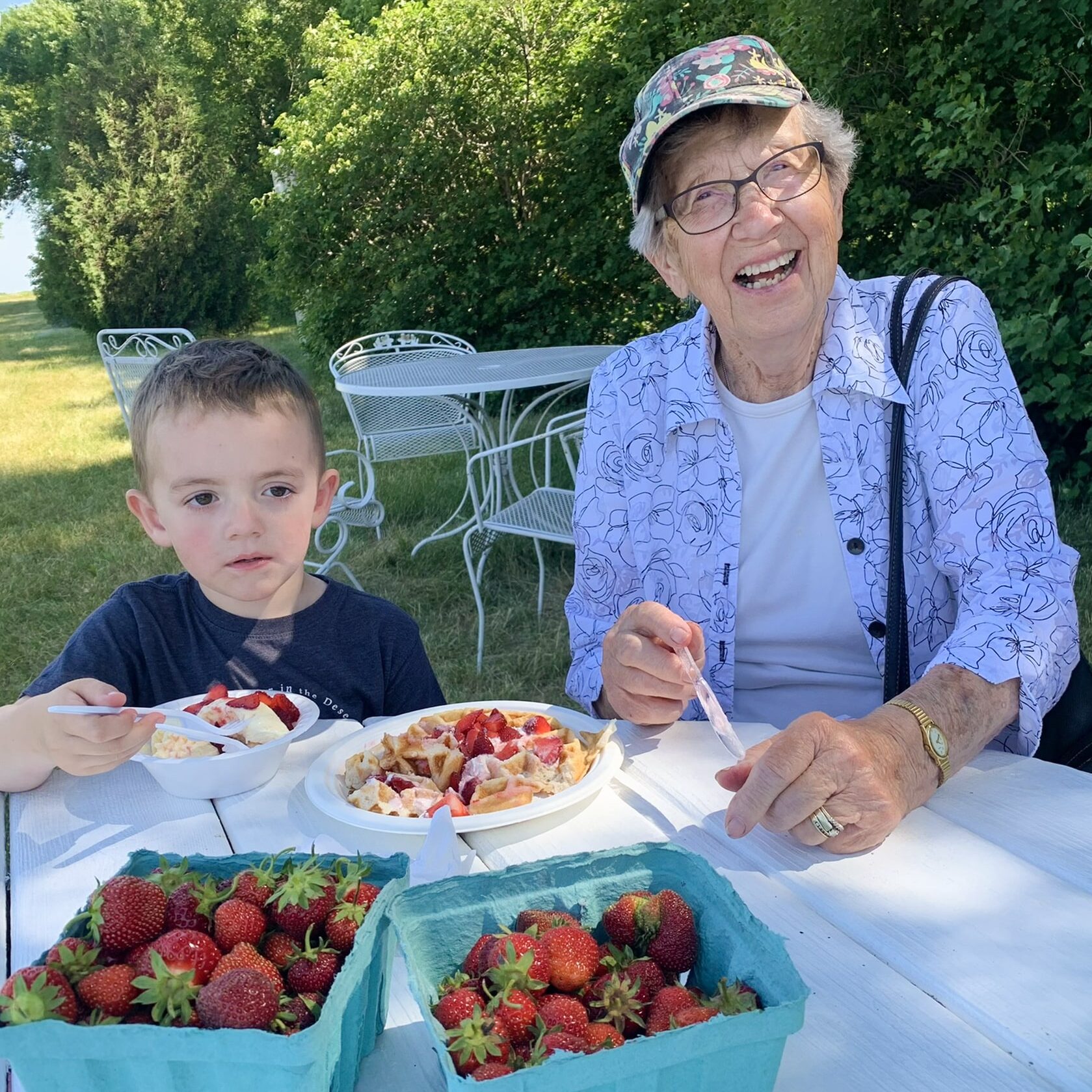 Grandmother And Great Grandson Share A Waffle And Ice Cream At H