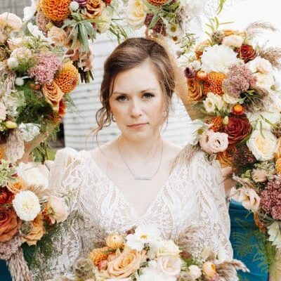 bride flowers orange and burgundy